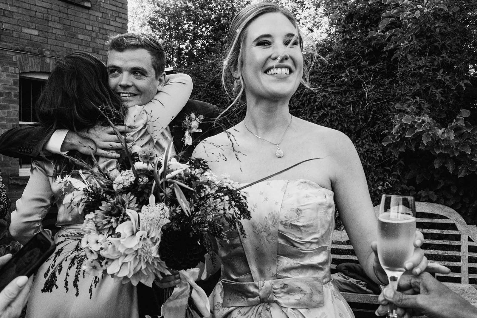 Happy smiles and hugs after the wedding