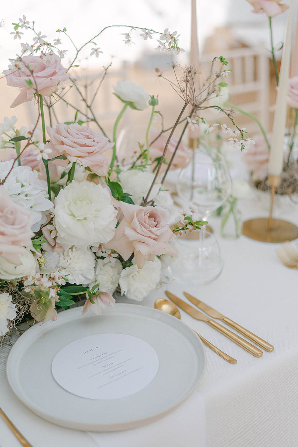 Wedding tables in the palest of blush pink and ivory tones
