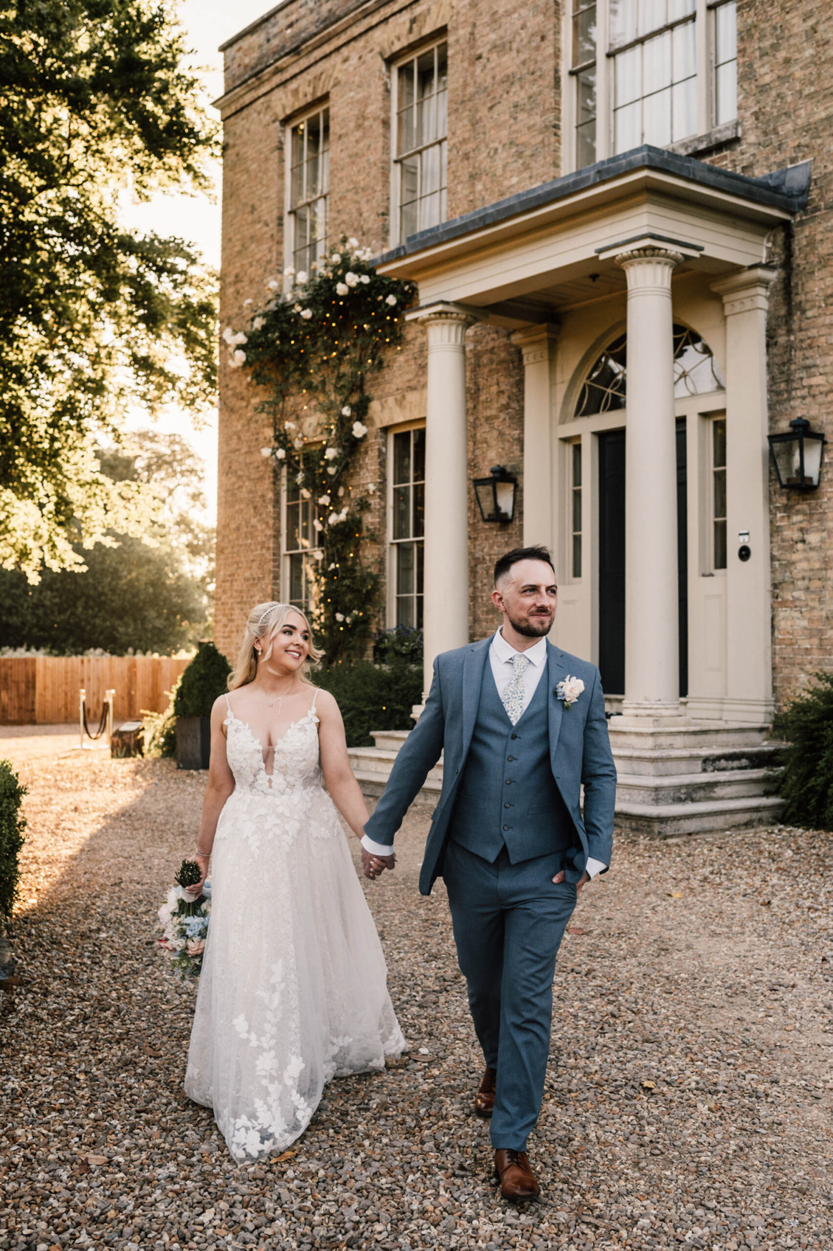 Bride and groom outside Shortmead House. By Damien Vickers Photography